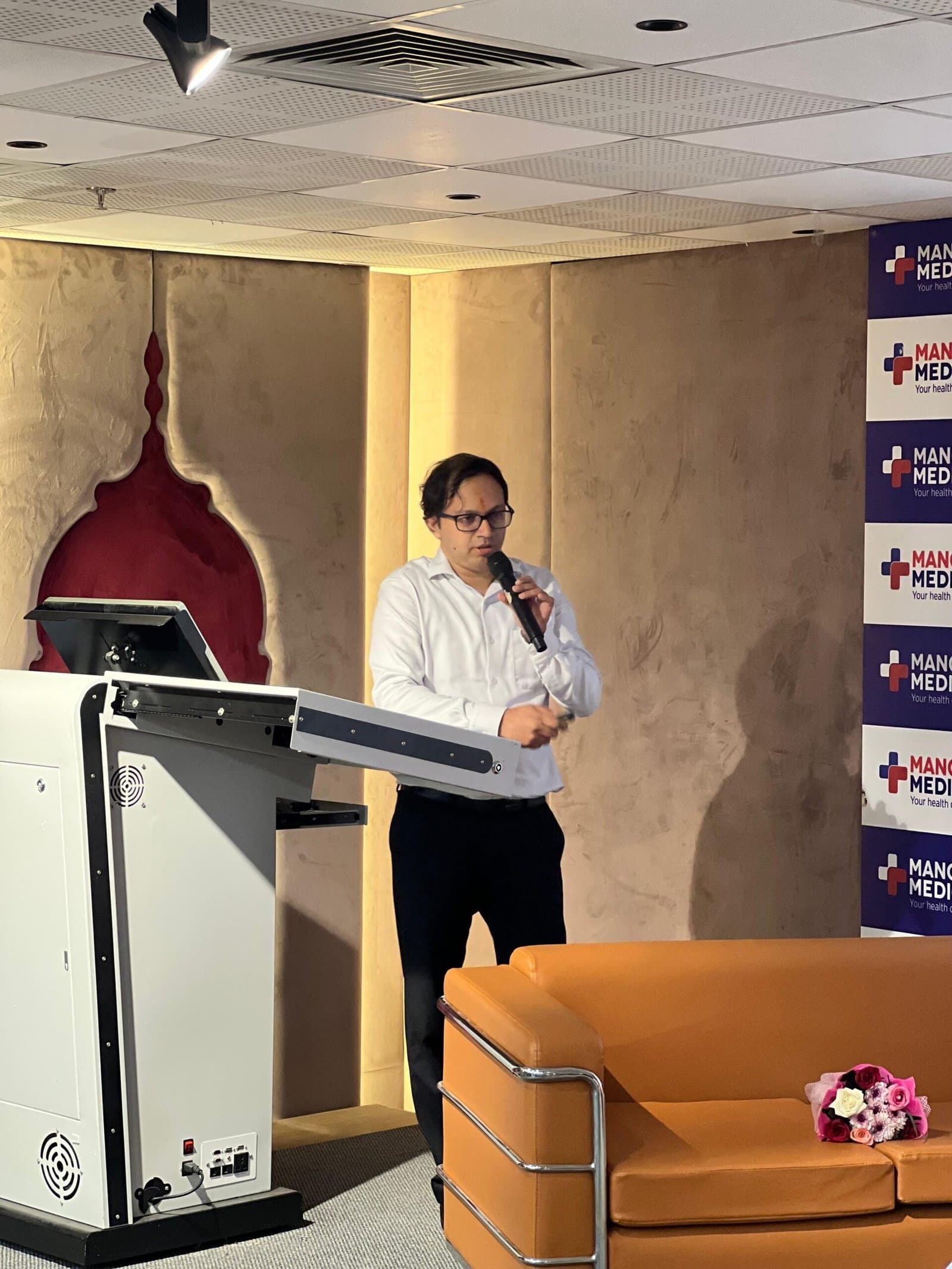 Dr. Nitin Negi speaking at the 150W Holmium laser launch